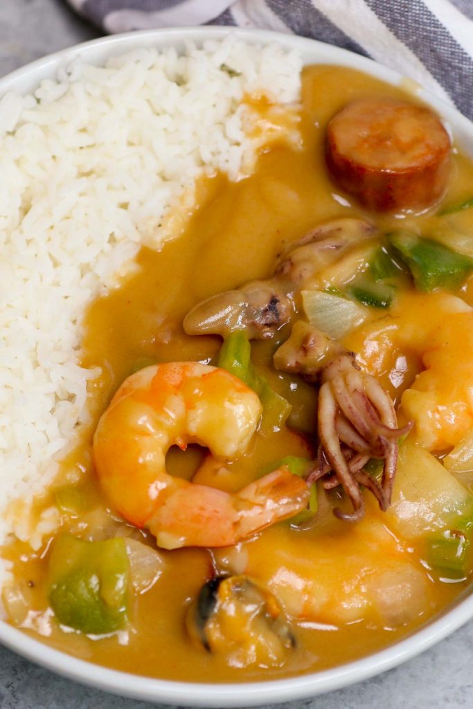 This Authentic Louisiana Seafood Gumbo is hearty, comforting, and made with a flavorful roux, mixed seafood, sausage, and vegetables. If you take a trip to New Orleans, you’re sure to find gumbo on the menu. Now, you can recreate this delicious gumbo recipe in the comfort of your own home.