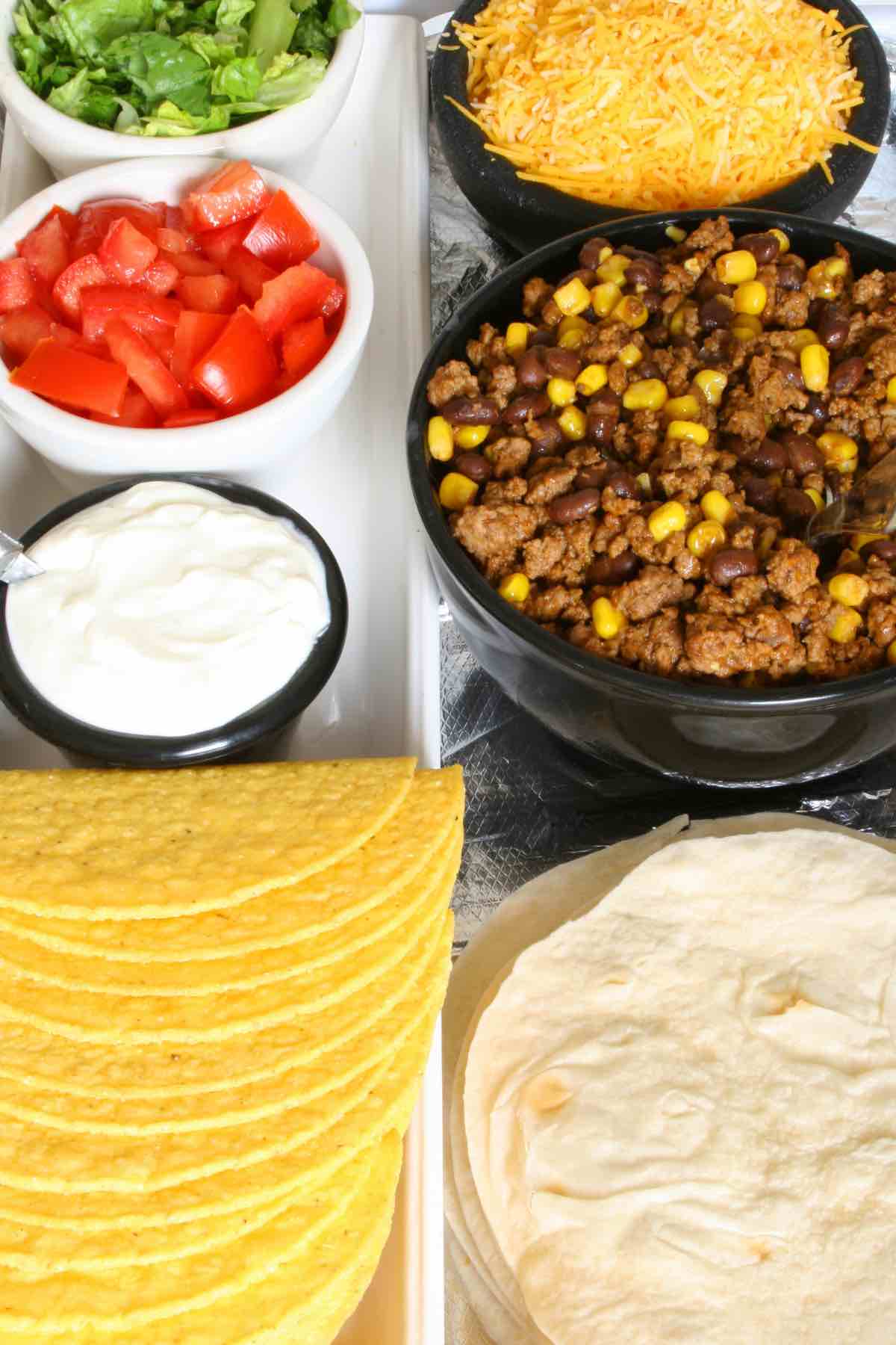 Taco Tuesday? Or simply craving tacos? Why not go all the way and have a taco bar?! It’s a lot easier to put together than you think, and we've collected 16 Best Taco Bar Ideas that will take your love for tacos to a new level!