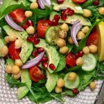 Loaded with garbanzo beans, fresh vegetables, and feta cheese, Chickpea Salad is a healthy dish packed with proteins.