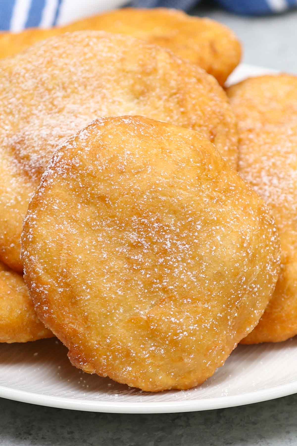 If you want to recreate the experience of a county fair or amusement park at home, there’s no easier way than with Fried Dough. This simple treat is a popular street food that is often enjoyed at outdoor activities.