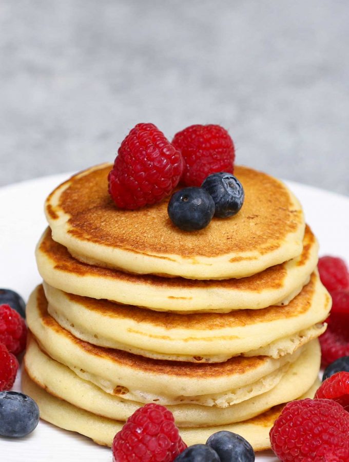 These Easy Griddle Cakes (Griddle Pancakes) are light and fluffy – a classic breakfast food that calls for a few simple ingredients. This recipe provides step-by-step instructions for cooking the batter on an electric griddle. You can serve them with maple syrup, jam, or fruits for a delicious meal!