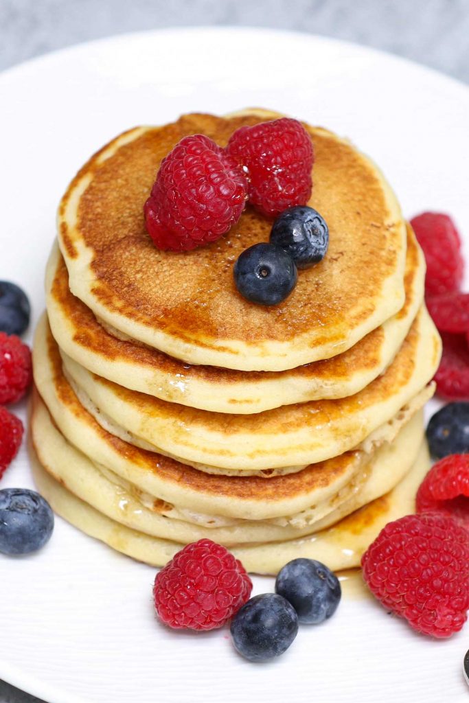 These Easy Griddle Cakes (Griddle Pancakes) are light and fluffy – a classic breakfast food that calls for a few simple ingredients. This recipe provides step-by-step instructions for cooking the batter on an electric griddle. You can serve them with maple syrup, jam, or fruits for a delicious meal!