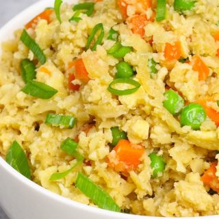 Cauliflower Fried Rice is delicious, Keto-friendly, and so easy to make. It’s one of our favorite Keto side dishes recipes and perfect for managing your carb intake.