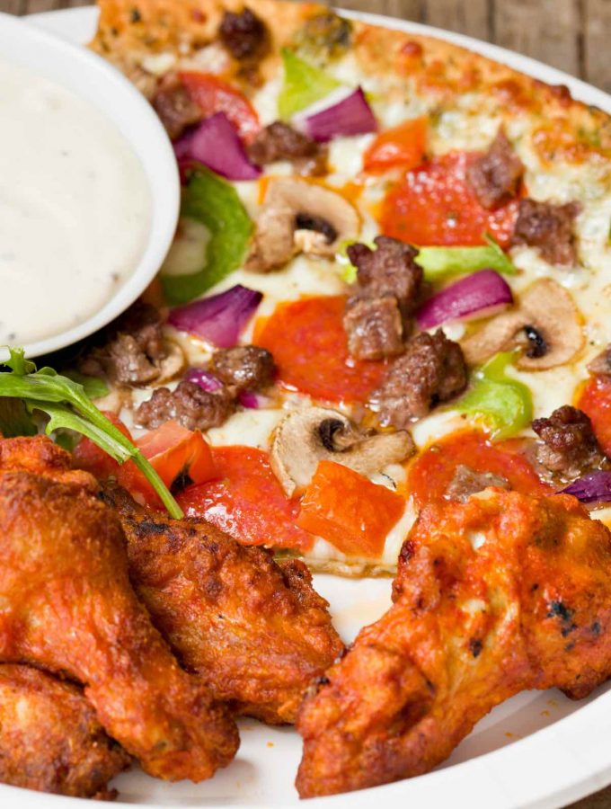 If you're struggling with what to serve with your pizza, you've come to the right place. From healthy vegetables to delicious chicken wings, below you will find 21 of the Best Pizza Sides that will complement your pizza and fill up your guests! 