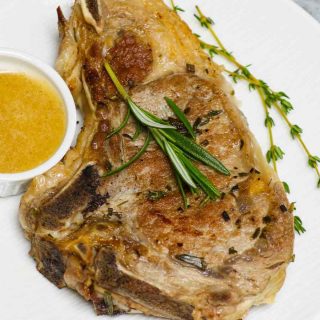 These Veal Chops are quick and easy to make, with a taste that’s worthy of a Michelin star. Bone-in veal chops are marinated with fresh rosemary, thyme, salt and pepper, then tenderized to succulent perfection.