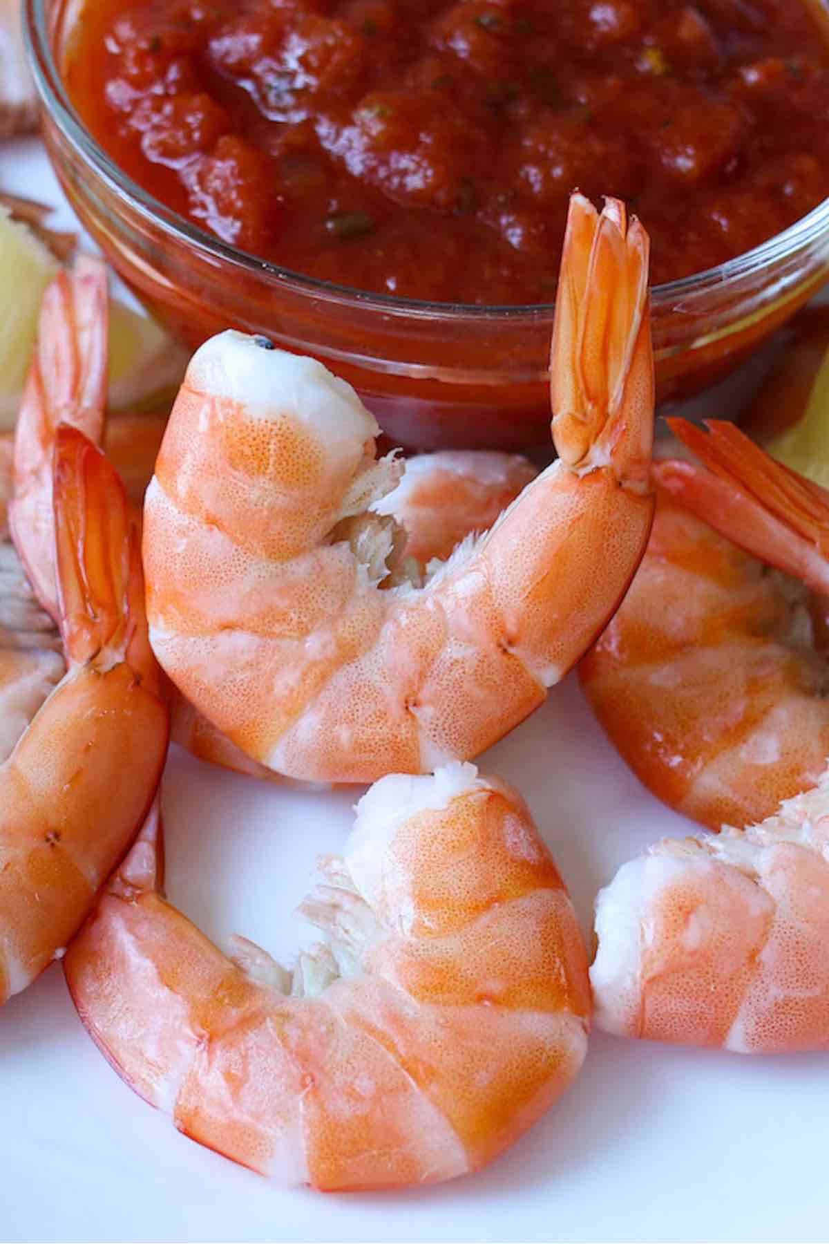 Did you know that you can cook frozen shrimp straight out of the freezer with no thawing necessary? Once you learn some simple tips, you’ll get juicy and delicious shrimp every time. We’ve covered different easy methods on cooking frozen shrimp.