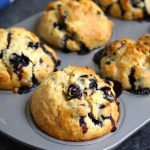 These Homemade Blueberry Muffins are moist, fluffy, and healthy. This recipe uses whole wheat flour and the muffins are low in sugar and high in fiber.