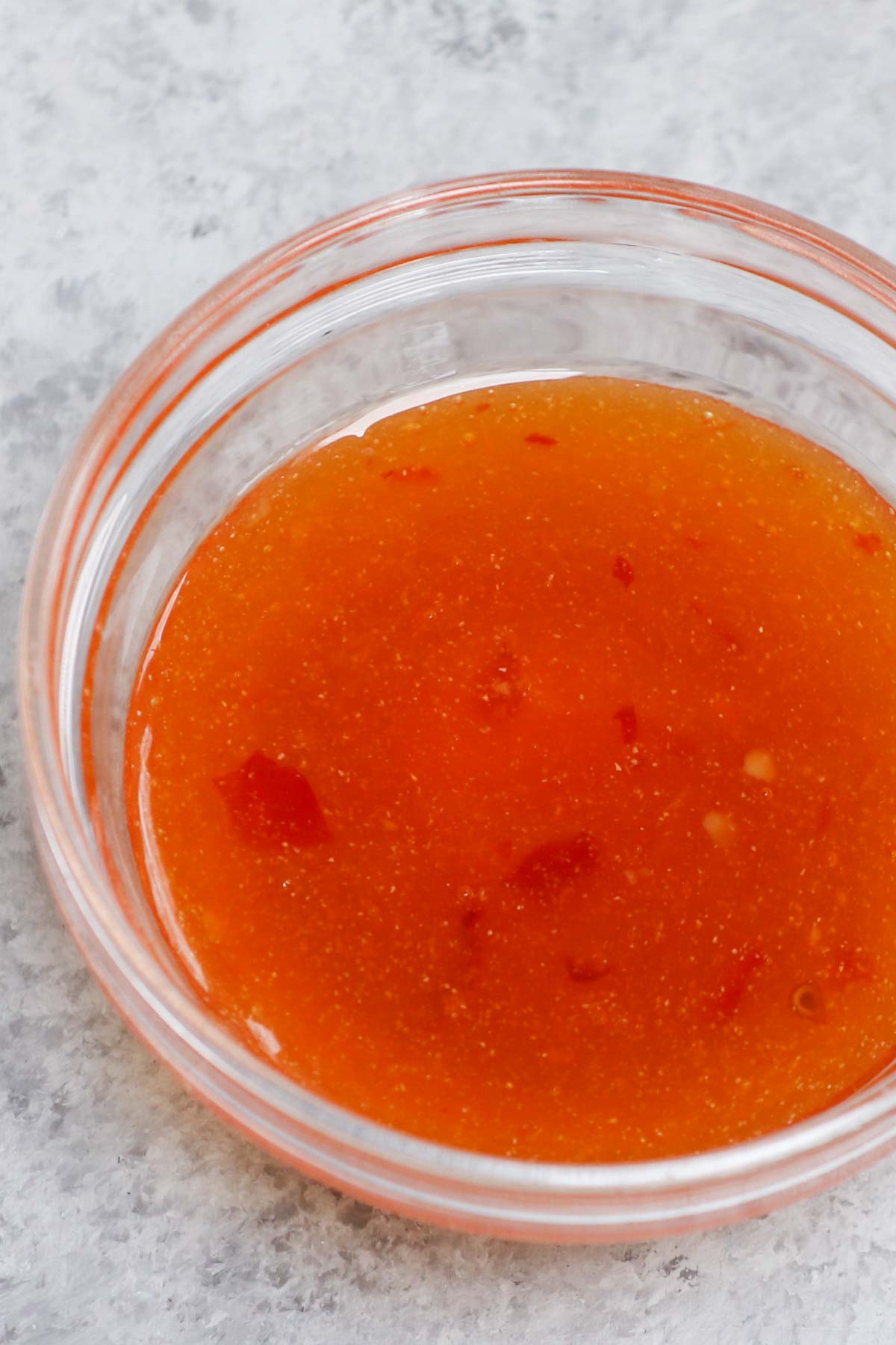 Ever wondered how you can make your very own Duck Sauce? It’s much easier than you think! It is a sweet and sour sauce that’s often used as a dip for spring rolls, crispy noodles, egg rolls, or drizzled on top of your favorite dishes. With only 5 simple ingredients, it takes just a few minutes to put this tangy sauce together.