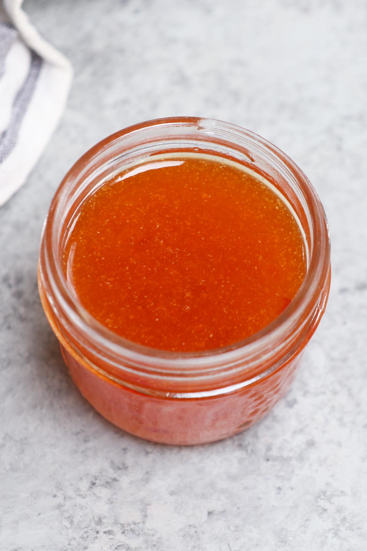 Ever wondered how you can make your very own Duck Sauce? It’s much easier than you think! It is a sweet and sour sauce that’s often used as a dip for spring rolls, crispy noodles, egg rolls, or drizzled on top of your favorite dishes. With only 5 simple ingredients, it takes just a few minutes to put this tangy sauce together.
