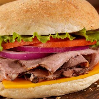The Roast Beef Sandwich is a classic American sandwich made popular by diners and chain restaurants such as Arby’s. This homemade sandwich is so delicious and fairly simple, made with slices of meaty roast beef, veggies, sauces and melted cheese. You can customize it with all your favorite toppings and can be eaten hot or cold.