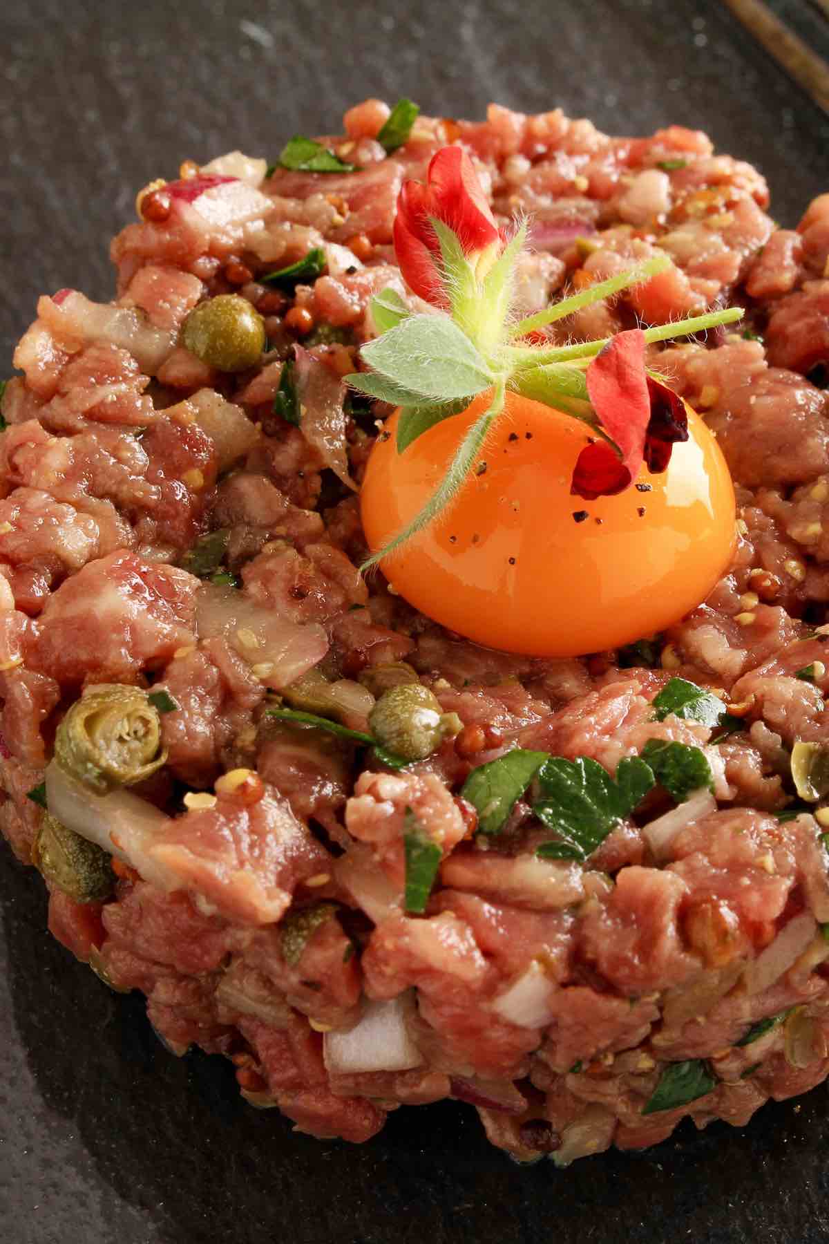 Steak Tartare is meaty, delicious, and full of flavor. Considered a French delicacy, this minced beef tartare is highly revered by foodies and steak connoisseurs who like their steak raw.