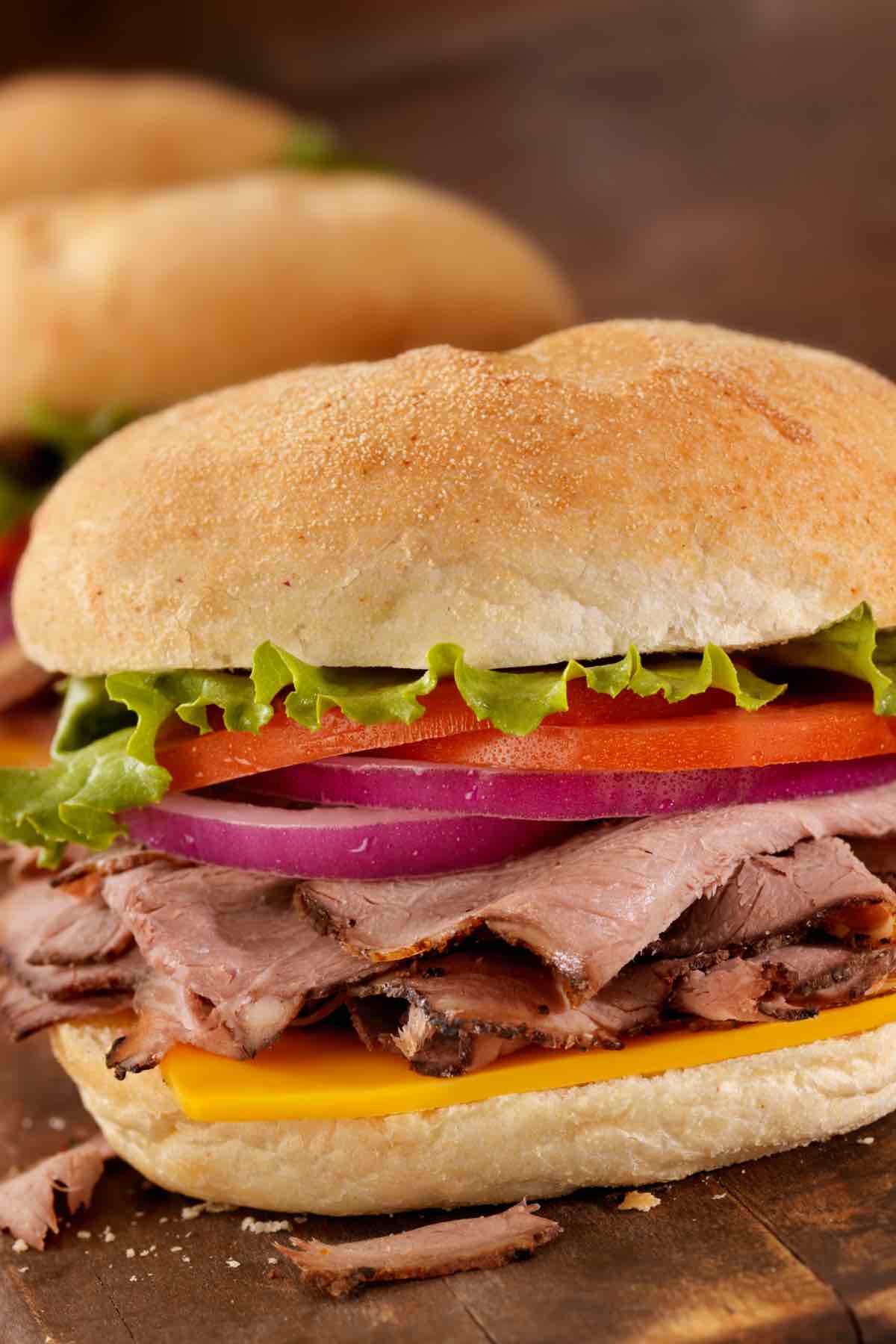 The Roast Beef Sandwich is a classic American sandwich made popular by diners and chain restaurants such as Arby’s. This homemade sandwich is so delicious and fairly simple, made with slices of meaty roast beef, veggies, sauces and melted cheese. You can customize it with all your favorite toppings and can be eaten hot or cold.