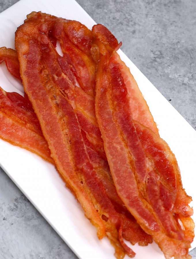 When bacon isn’t stored in proper conditions, or if it’s been stored for too long, it can become spoiled, just like any other meat. Consuming spoiled food is a health risk, so it’s important to learn how to tell if bacon is bad.
