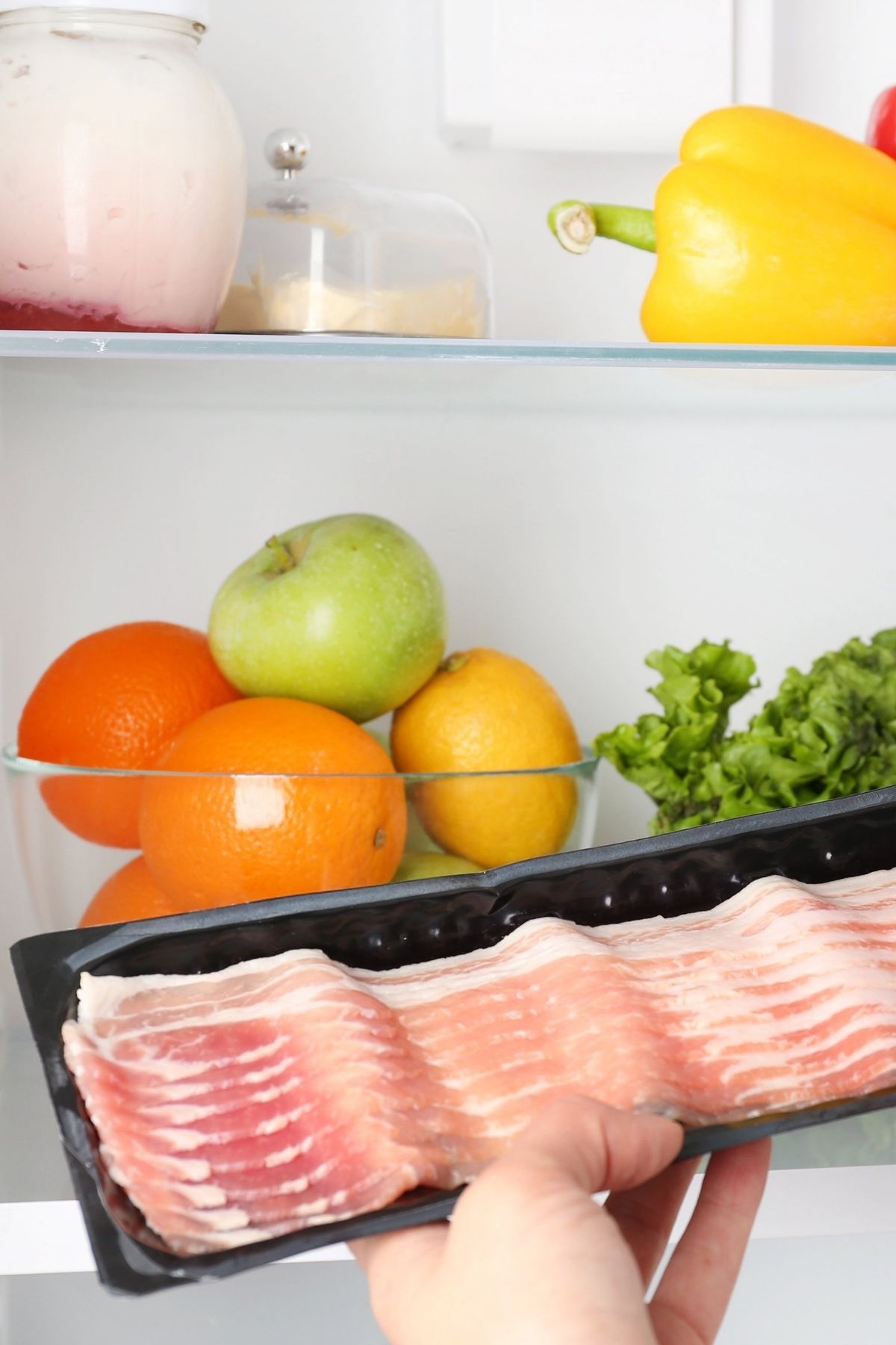 Bacon can make a quick breakfast or be transformed into a delicious dish. How long does bacon last in the fridge? It depends on whether the package is opened or unopened, and whether the bacon is raw or cooked.