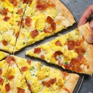 Breakfast Pizza is one of our favorite kid-friendly breakfast recipes. It uses a few simple ingredients and is incredibly delicious.
