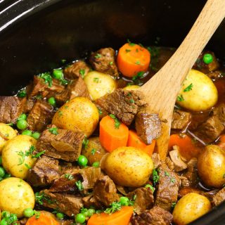 This slow cooker beef stew recipe is one of our favourite crockpot soup recipes - tender and delicious beef is simmered in a rich and divine sauce with carrots, onions, and potatoes