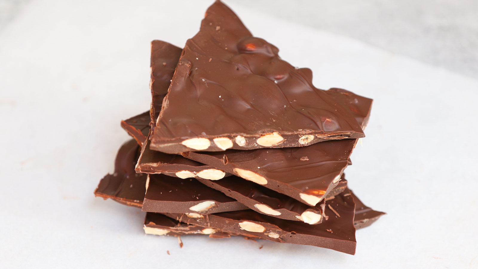 Satisfy your sweet tooth with homemade almond bark made with your choice of dark or white chocolate. Use high-quality chocolate chips or bars for the very best Chocolate Almond Bark. It’s a great treat that’s perfect for holiday gifts!
