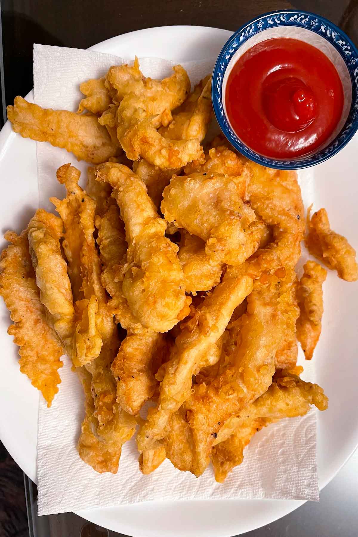 Besides sushi, another delicious menu item at Japanese restaurants is Chicken Tempura. These chicken tenders are light and crispy on the outside, with a juicy, meaty center. Enjoy them as an appetizer with your favorite dipping sauce, or use them to create fun and tasty bento boxes for lunch!