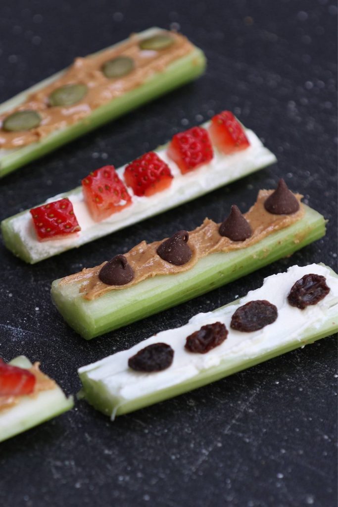 Ants on A Log are nutritious snacks that are loaded with celery, peanut butter, and raisins. They are so fun to make with kids and you can customize them easily with your favorite nuts and fruits.