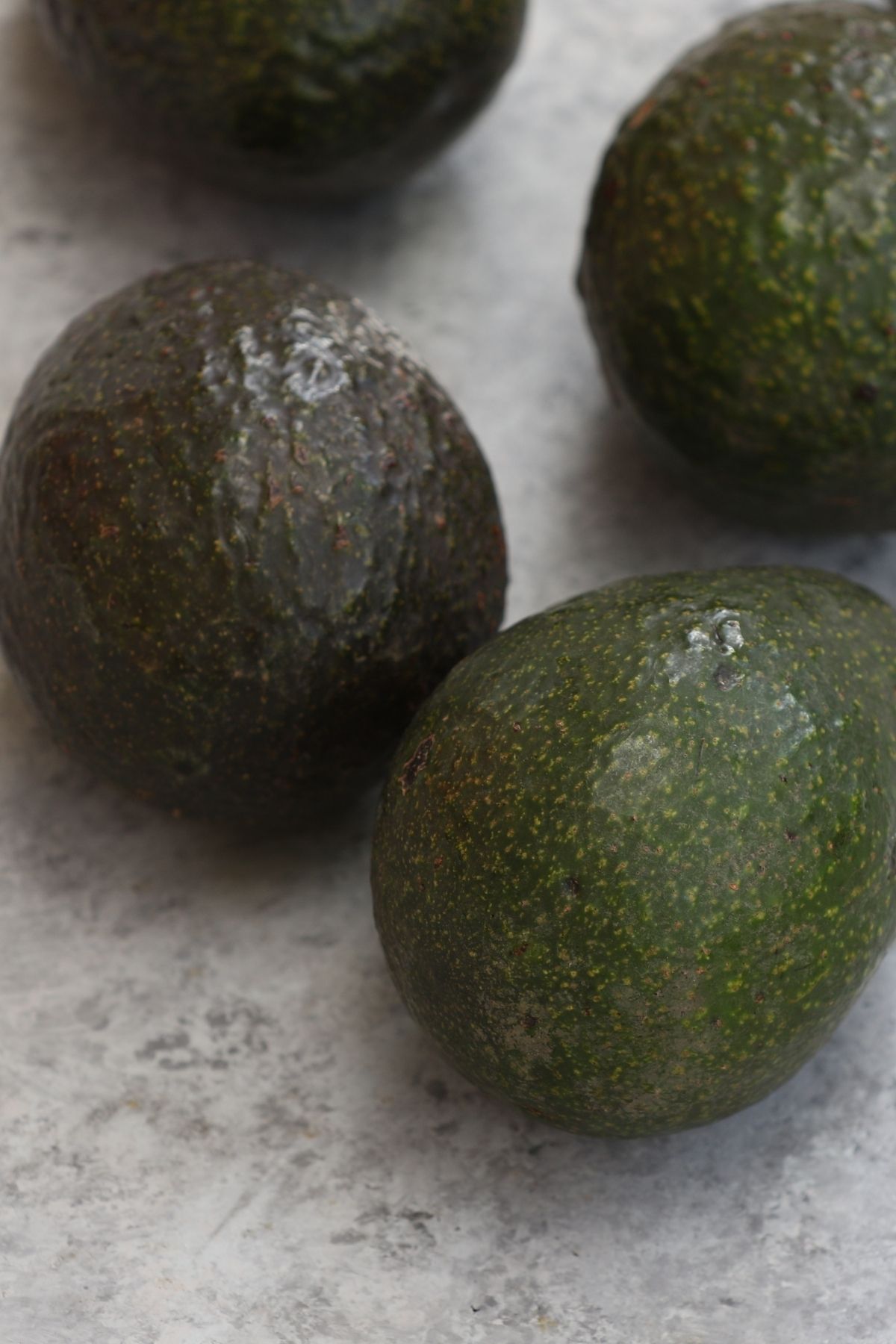 Learn how to ripen avocados quickly! This step-by-step guide shows you how to tell if an avocado is ripe along with 4 easy methods for ripening them faster. Enjoy the delicious and creamy ripe avocados every time!