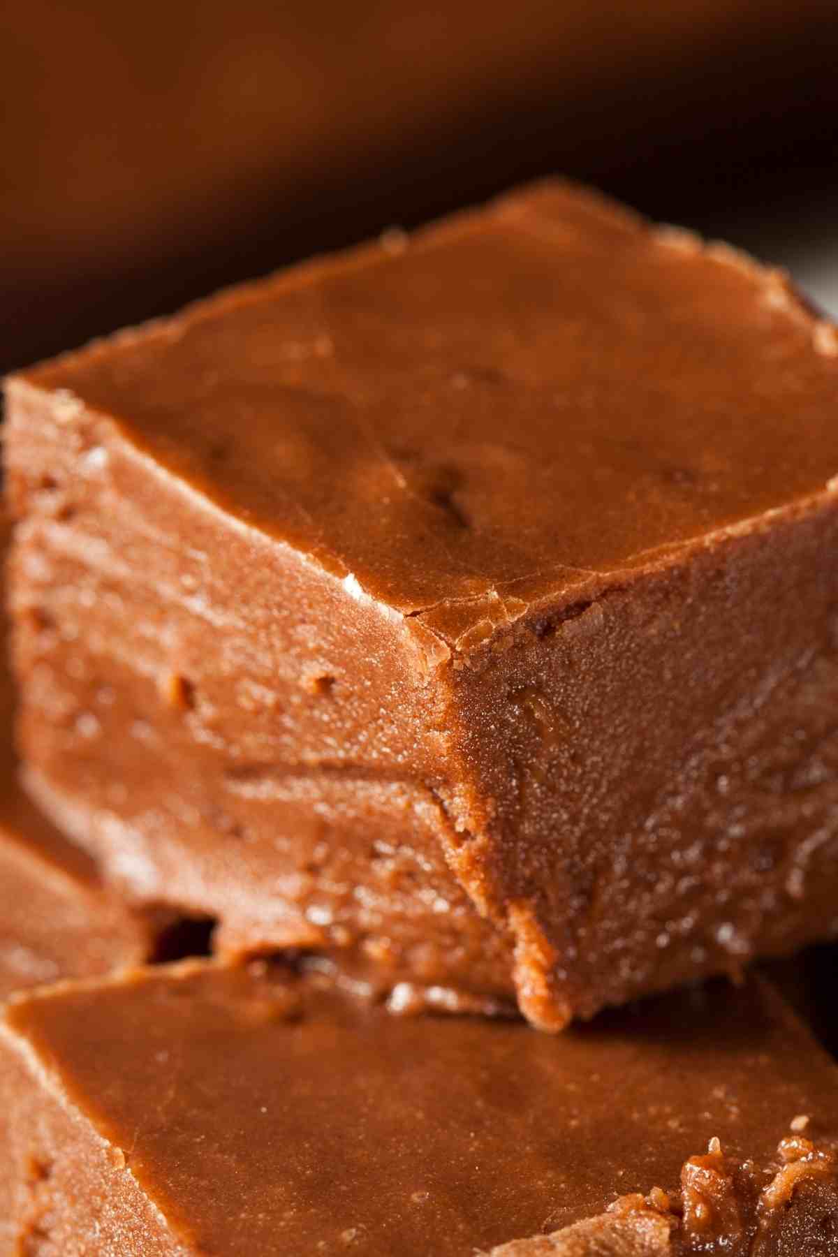 This simple fudge recipe is made without condensed milk. It’s sweet, creamy, chocolatey, and super easy to make.