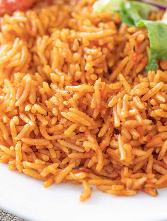Jollof Rice is probably Nigeria’s most famous dish. This one-pot meal is a staple in many West African households and has made its way to the West. Whether you want a simple mid-week dinner or a flavorful contribution to the potluck, you can’t go wrong with Jollof!