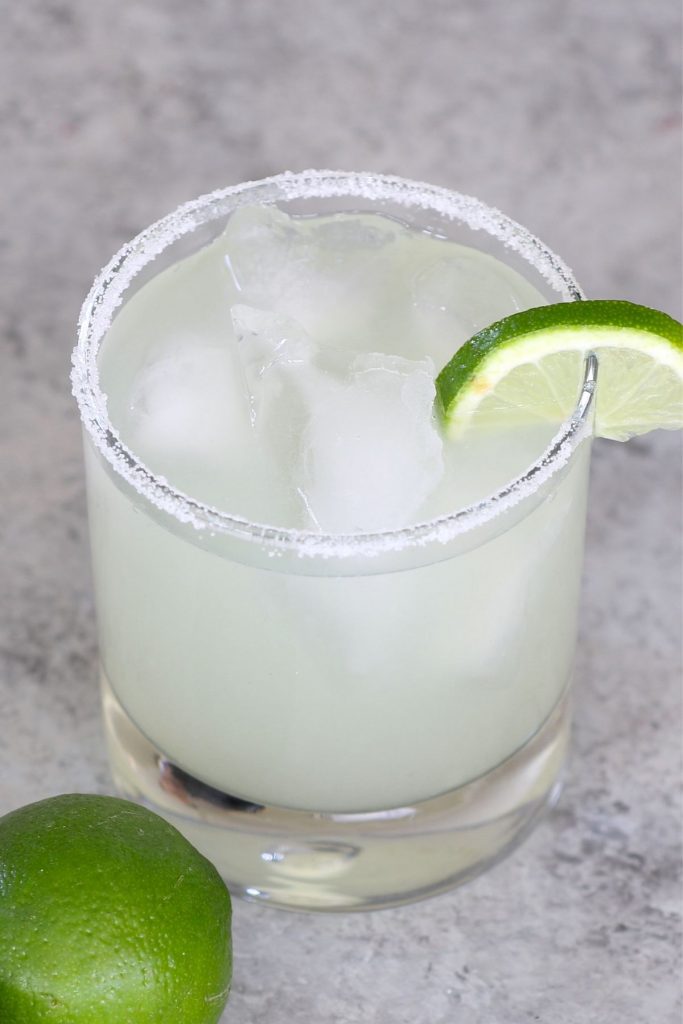 This Margarita on the Rocks combines sweet, sour and salty into one delicious cocktail you’ll want to enjoy again and again! They’re undeniably refreshing and set the mood for summertime parties, Cinco de Mayo and backyard cookouts. Best of all, there’s no need to head to a bar or a Mexican restaurant to get a taste!