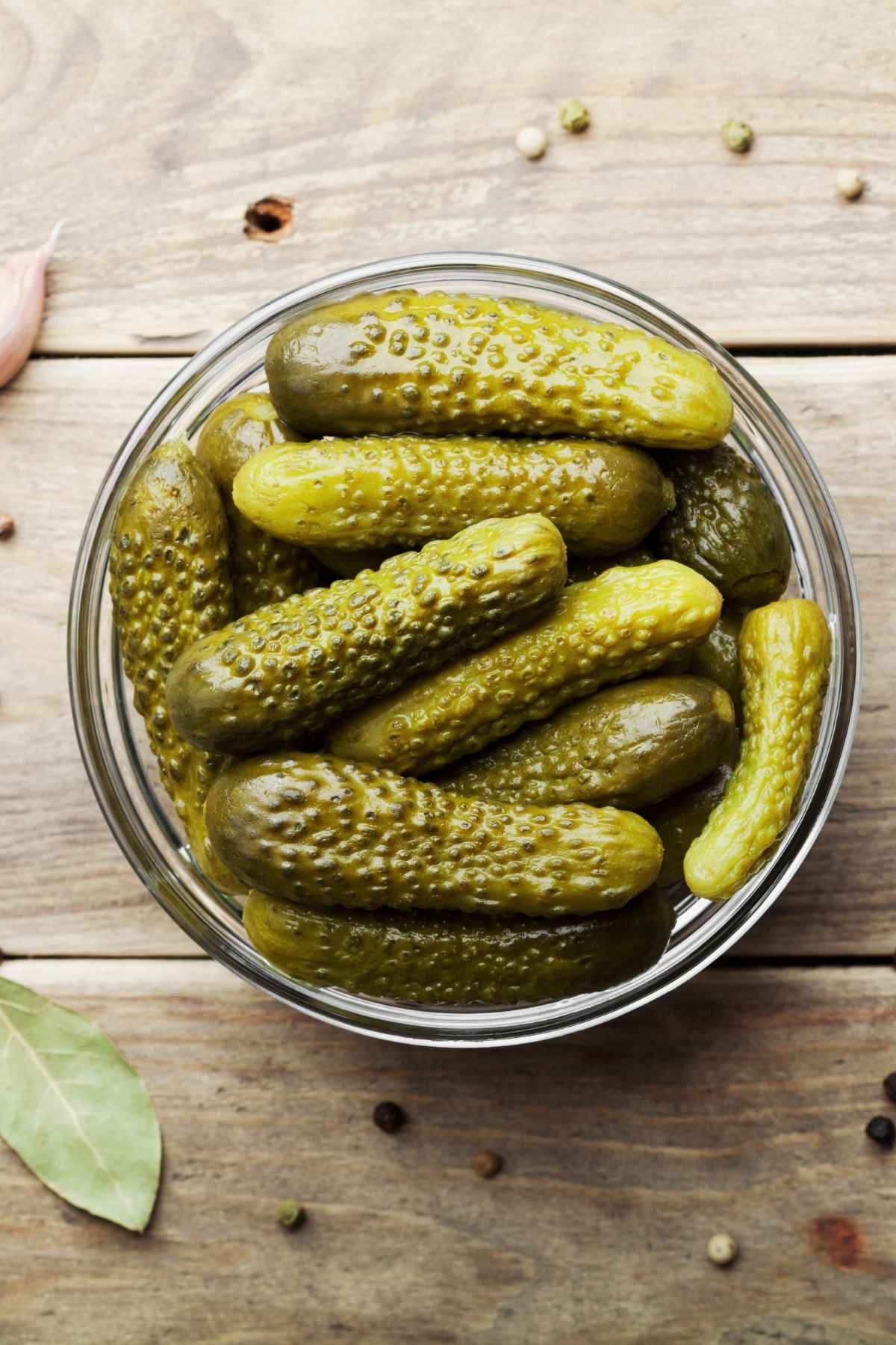 There’s nothing quite like the salty, sour snap of a juicy pickle. Whether you eat them straight out of the jar, or on burgers or deli sandwiches, they’re full of tangy flavor. Depending on where you live, you may refer to these delicious gems as pickles or gherkins, but are they the same thing?