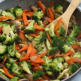 Hibachi Vegetables are loaded with delicious broccoli, carrots, zucchini, and mushrooms. This recipe takes less than 15 minutes to make and is unbelievably flavorful.