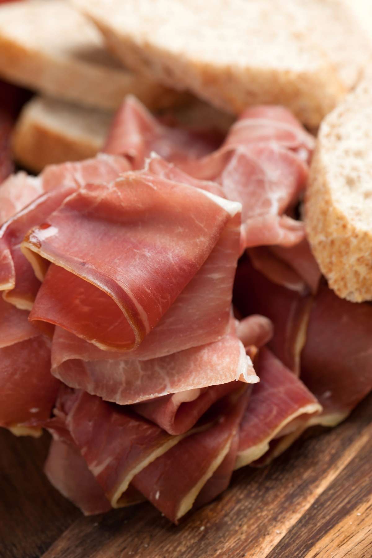 Prosciutto is a type of dry-cured Italian ham. It is often served in sandwiches, on pizza, with fruit, and on charcuterie boards. Today we’re taking a closer look at prosciutto, the different types that are available, and how it's prepared.