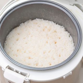 Cooking rice in a rice cooker produces the best fluffy rice! Whether you’re cooking jasmine, basmati, white long grain, or brown rice, we’ll show you the best rice to water ratio for the most delicious rice!