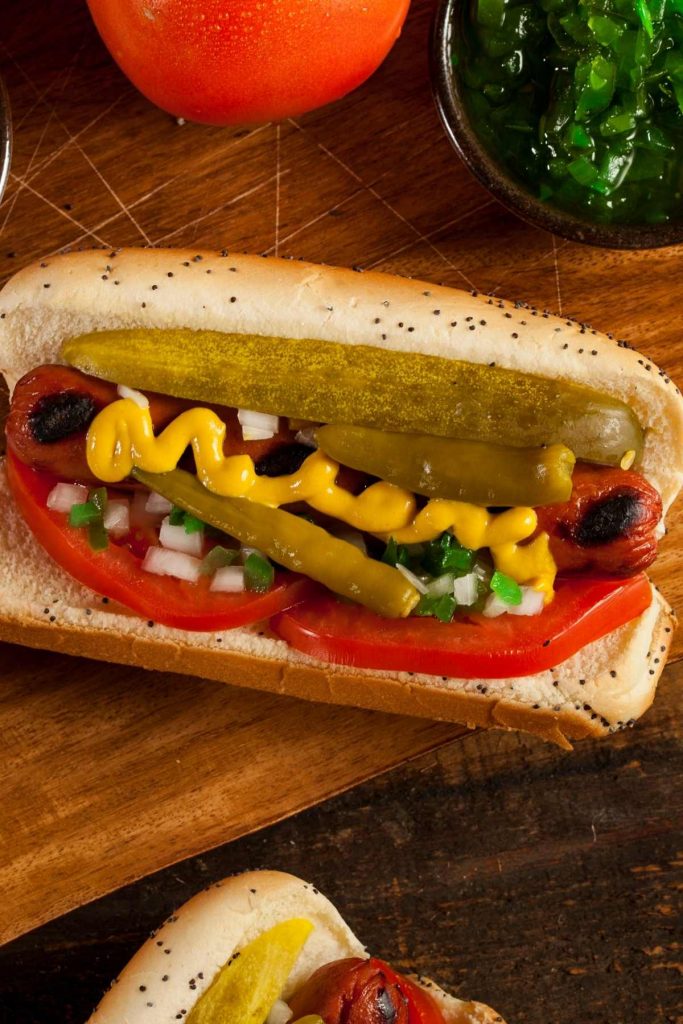 A Chicago-Style Hot Dog is something you’ve got to experience. Juicy all-beef frankfurters are served in a toasted poppy seed bun and topped with delicious veggies.