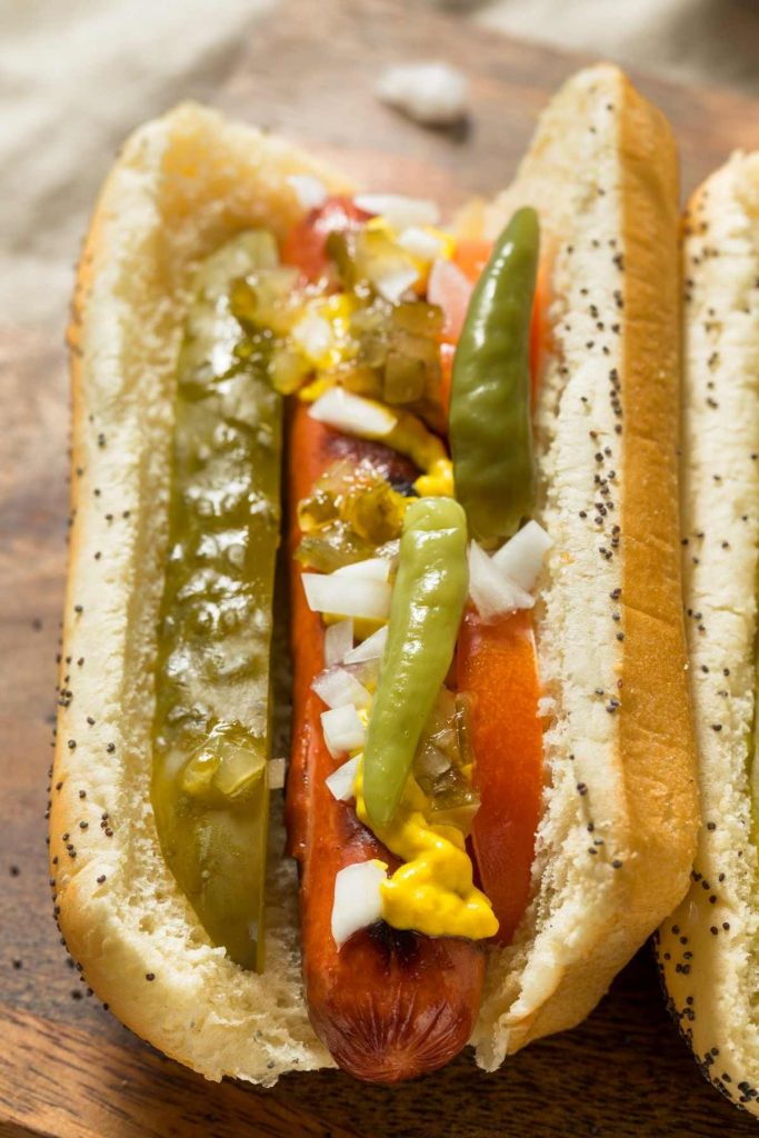 A Chicago-Style Hot Dog is something you’ve got to experience. Juicy all-beef frankfurters are served in a toasted poppy seed bun and topped with delicious veggies.