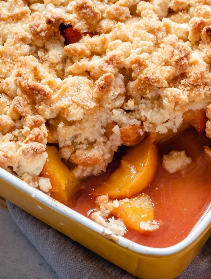 This Peach Cobbler Made with Cake Mix is fruity, summery, and refreshing. With just 4 simple ingredients, you can have a freshly baked cobbler bursting with fruit flavor. 