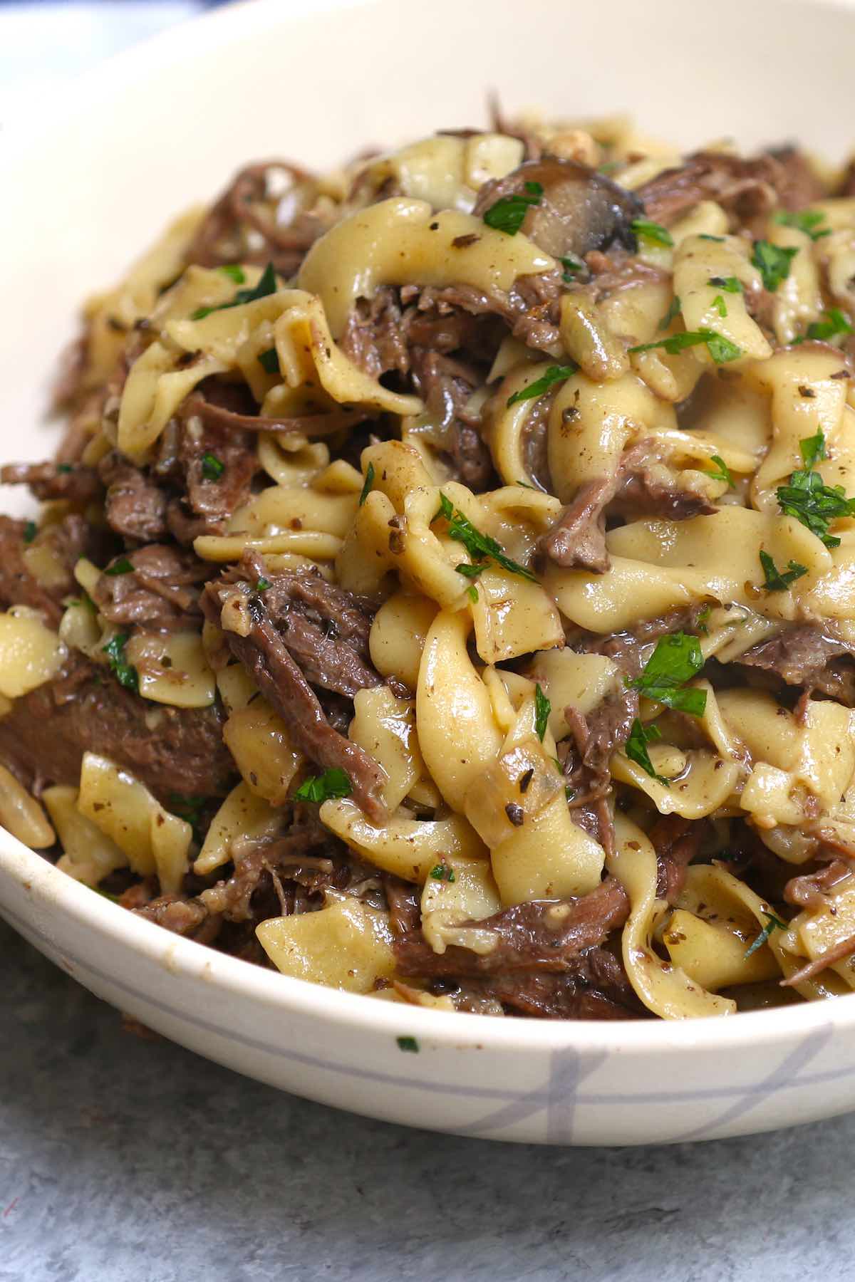 Tender and comforting Beef Tips and Noodles are the perfect dish to serve for a Sunday dinner with the family. The beef is simmered low and slow in a creamy sauce and it’s served on a bed of egg noodles. All you need is a side of steamed broccoli or asparagus for a hearty and satisfying meal.