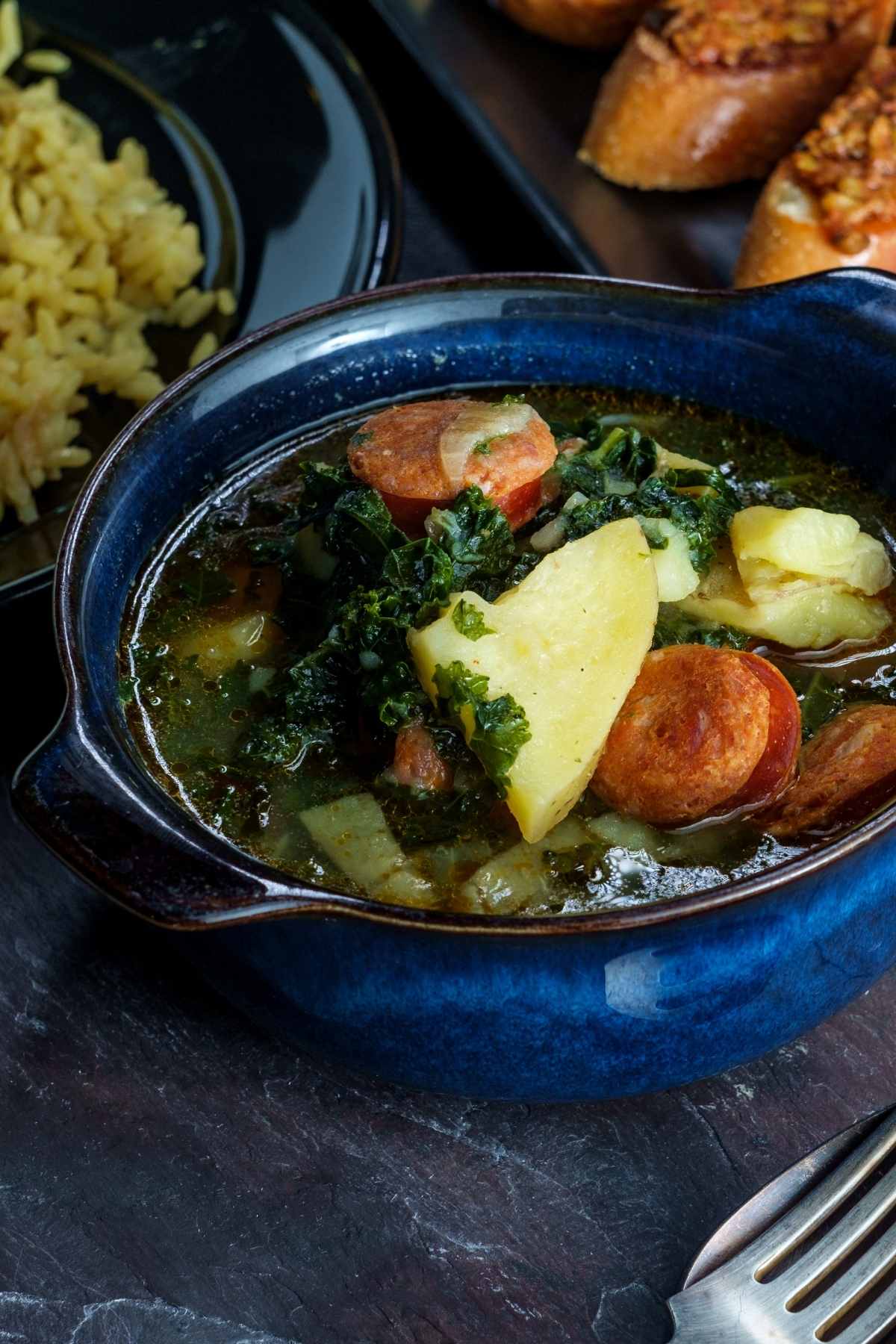 Caldo Verde is a simple but hearty soup from Portugal. It’s made with linguica, a smoked cured pork sausage flavored with paprika and garlic. It's a delicious and quick meal that is also comforting.