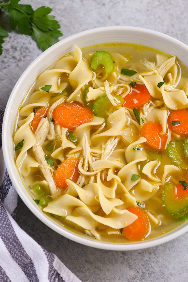 A warm bowl of Chicken Thigh Soup is the ultimate comfort food. It’s satisfying, healthy, and easy to make from scratch! With some easy ingredients, you can enjoy this delicious chicken thigh noodle soup for dinner tonight.