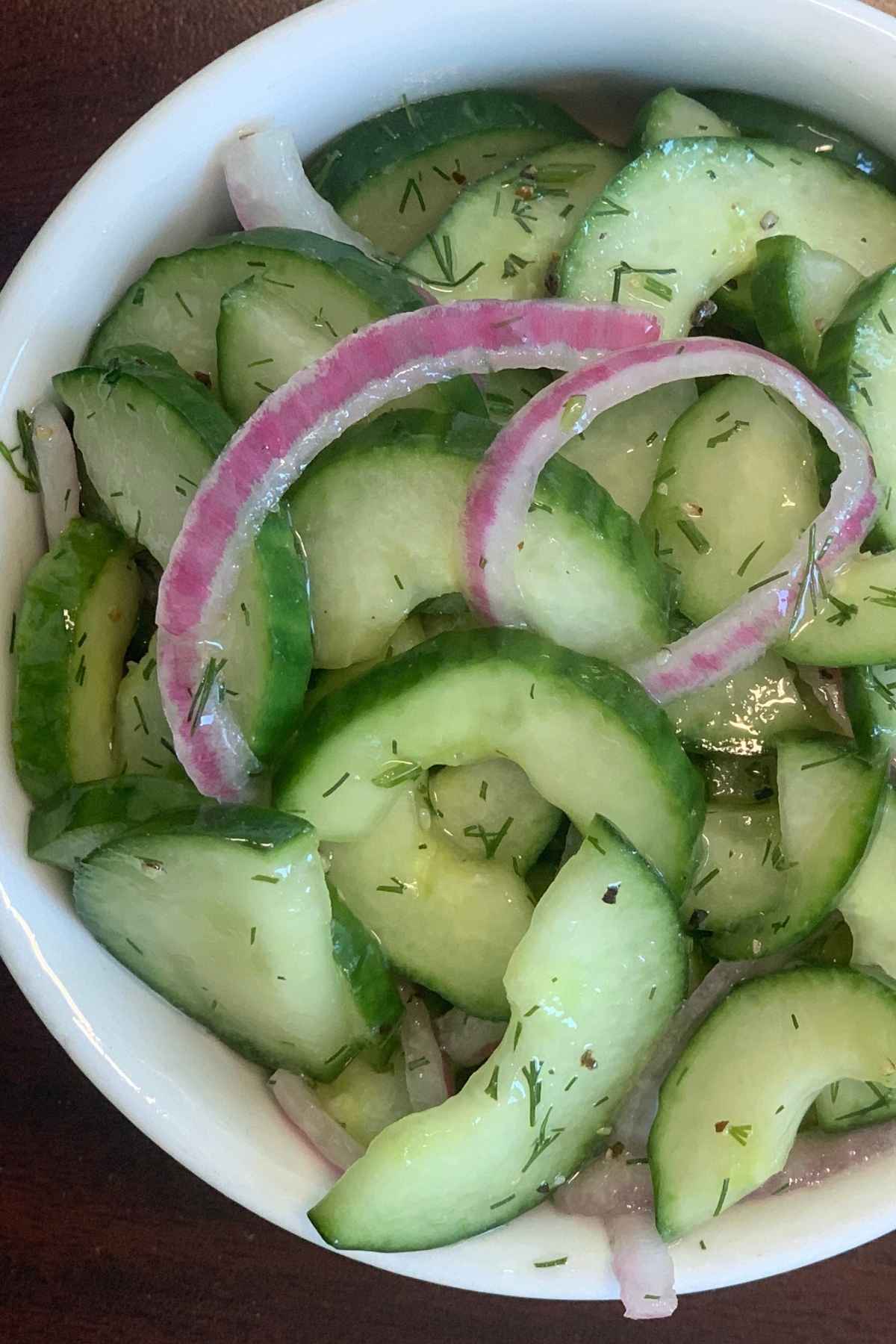 Old Fashioned Cucumbers and Onions in Vinegar are refreshing, flavorful, and refreshing. It comes together quickly and with just a few simple ingredients.