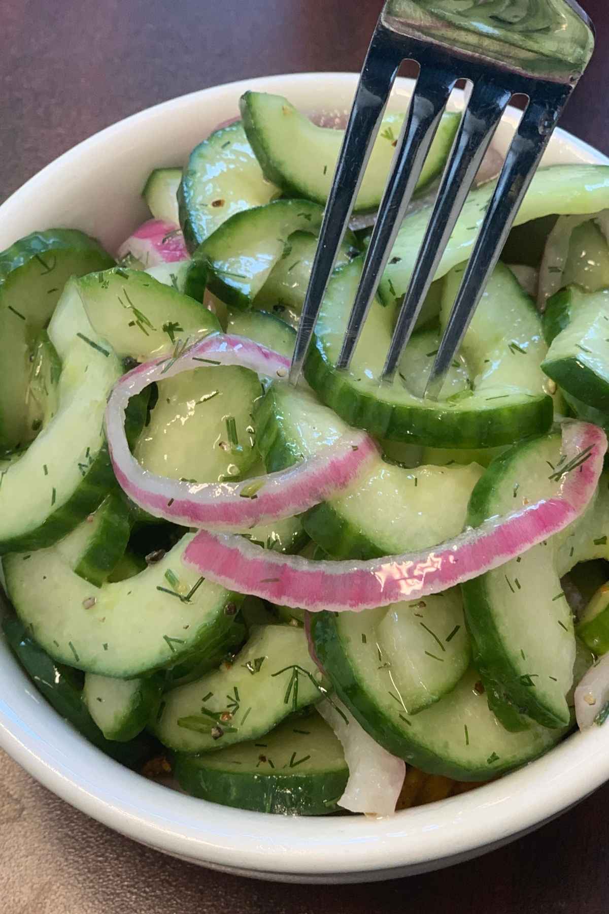Old Fashioned Cucumbers and Onions in Vinegar are refreshing, flavorful, and refreshing. It comes together quickly and with just a few simple ingredients.