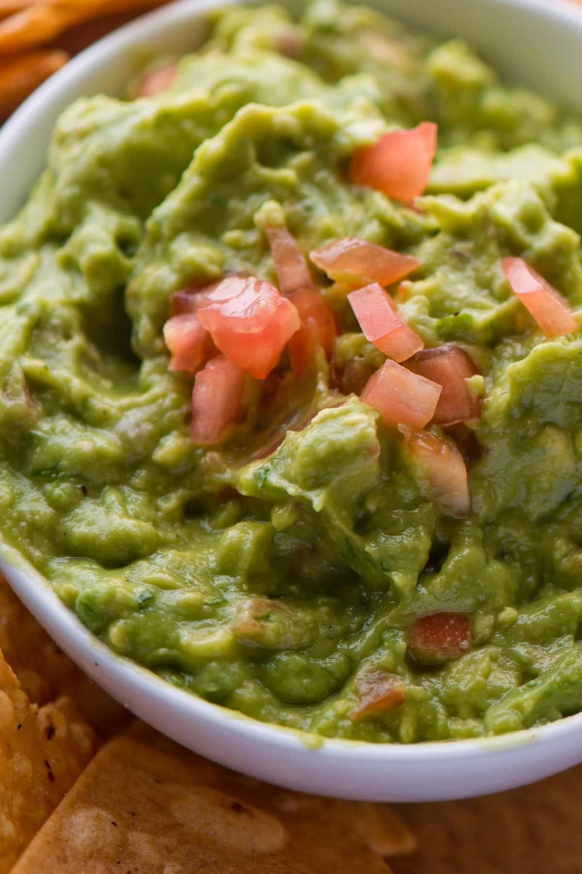 If you’ve been searching for guacamole that rivals anything you’ve had at a restaurant, this is the one. This Simple Homemade Guacamole Dip adapted from Alton Brown’s recipe is perfect to enjoy with your favorite Mexican dishes, and is also delicious served on toast!