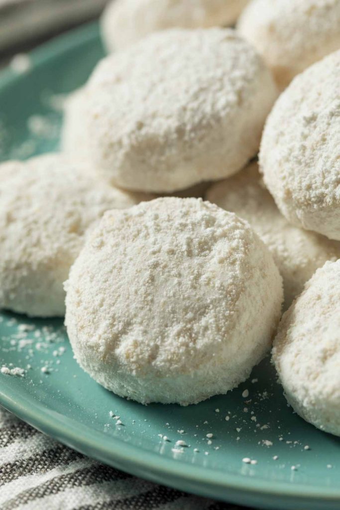 Also known as Mexican wedding cakes, these delicious Mexican Wedding Cookies are soft, sweet, and melt in your mouth. They’re delicately flavored with vanilla, and the crushed pecans add a delicate crunch.