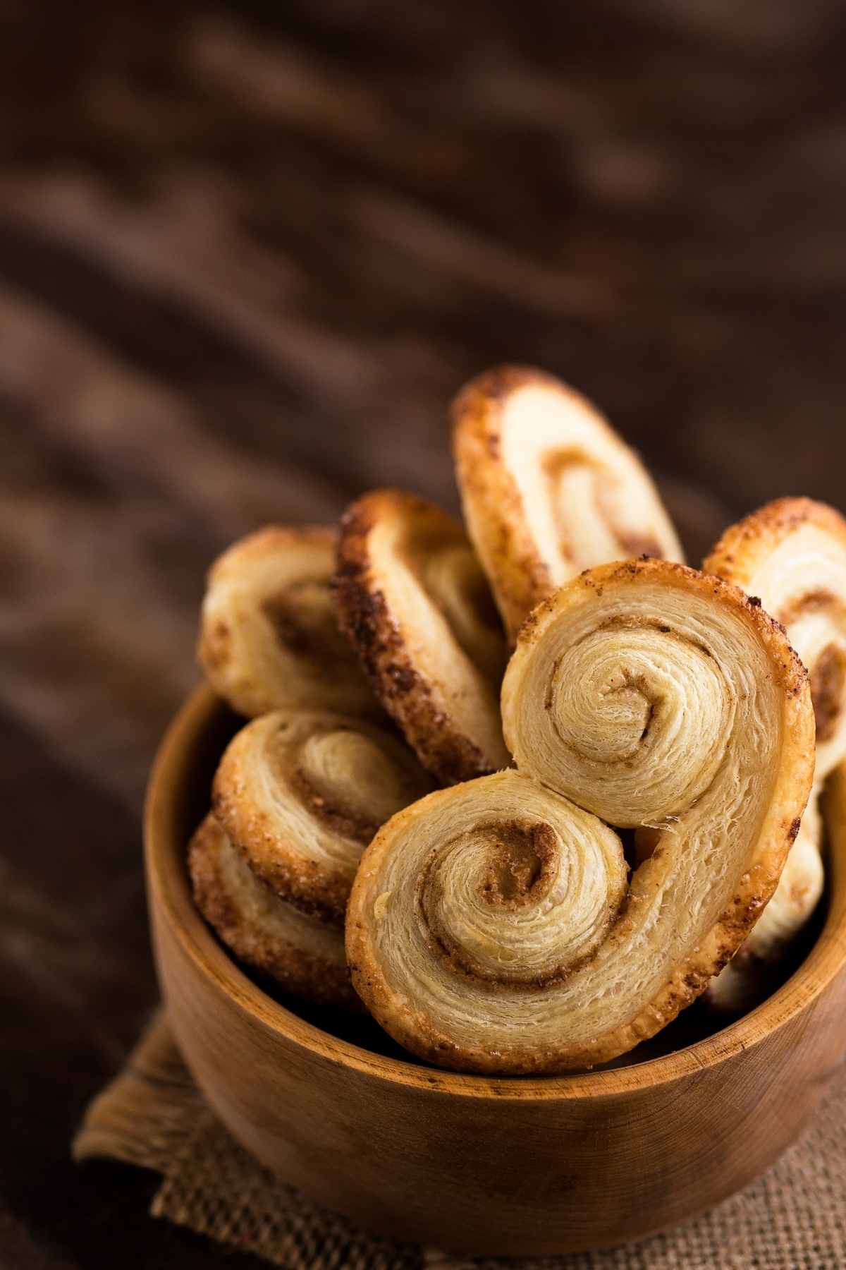 French Palmier pastry cookies are delicate, flaky, and delicious! They’re made with puffed pastry and are sure to impress your guests.