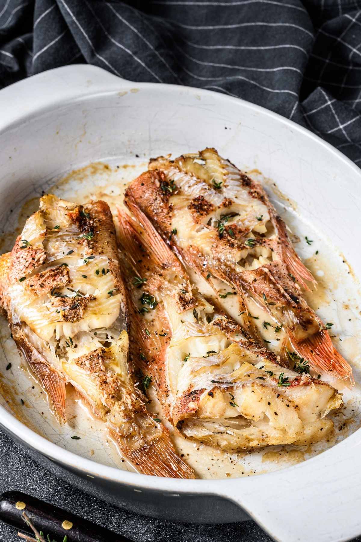 Red snapper is a versatile fish that can be enjoyed grilled, pan-fried, steamed, baked, or deep-fried. Our favorite way to cook snapper is to bake it with lemon, garlic, and butter. It cooks quickly, making it an ideal choice for busy weeknights.