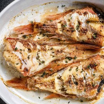 Red snapper is a versatile fish that can be enjoyed grilled, pan-fried, steamed, baked, or deep-fried. Our favorite way to cook snapper is to bake it with lemon, garlic, and butter. It cooks quickly, making it an ideal choice for busy weeknights.