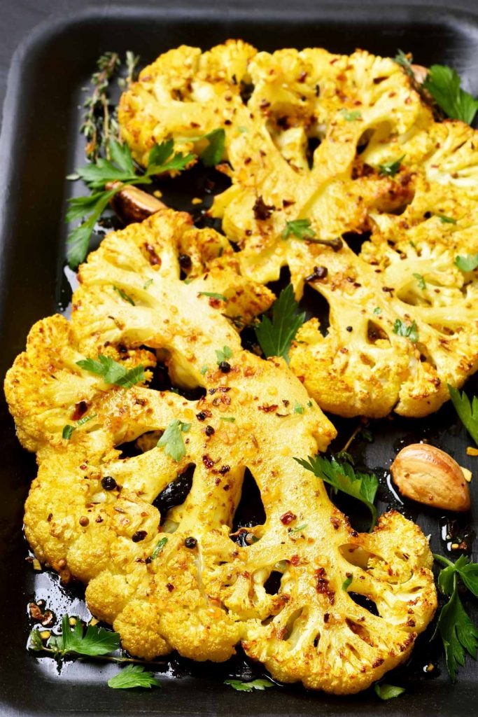 Cauliflower is a healthy and delicious vegetable that’s super easy to make. This Roasted Cauliflower Steak with Parmesan recipe uses a handful of ingredients and is a delicious side to whatever you’re serving for dinner.