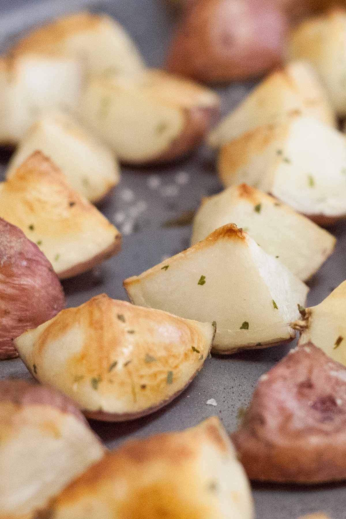 Roasted White Potatoes are a favorite side dish with just about everyone! They’re creamy on the inside, crispy on the outside, and pair well with other veggies and meat.