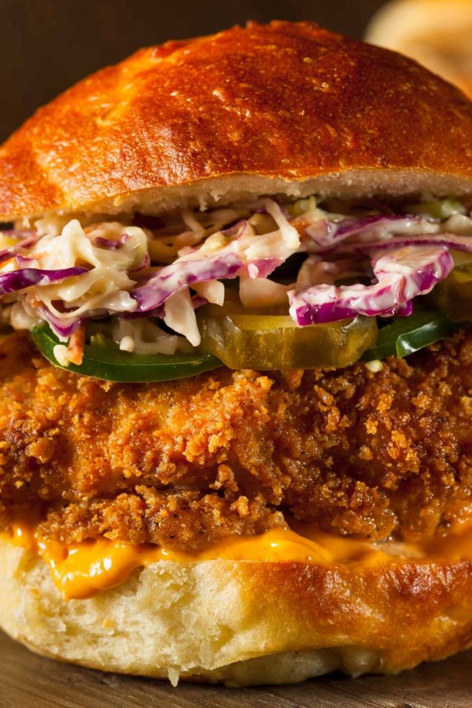 Crispy and spicy chicken sandwiches are one of the most popular menu items at fast food restaurants. Topped with mayo, lettuce, and tomatoes, every bite is delicious! If you love spicy chicken sandwiches, there’s no need to leave your home. You can make your own!