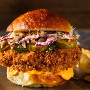 Crispy and spicy chicken sandwiches are one of the most popular menu items at fast food restaurants. Topped with mayo, lettuce, and tomatoes, every bite is delicious! If you love spicy chicken sandwiches, there’s no need to leave your home. You can make your own!
