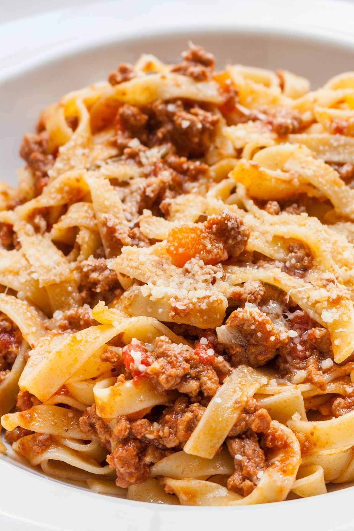 Tagliatelle Bolognese is a popular Italian dish that's loaded with tender tagliatelle noodles and rich bolognese sauce. It takes about 45 minutes to prepare, making it a good option for busy weeknights.
