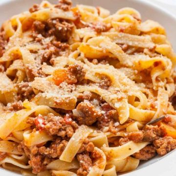 Tagliatelle Bolognese is a popular Italian dish that's loaded with tender tagliatelle noodles and rich bolognese sauce. It takes about 45 minutes to prepare, making it a good option for busy weeknights.
